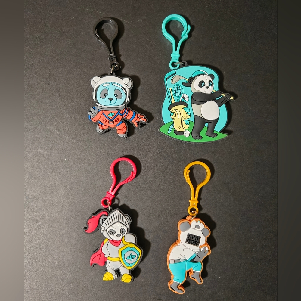 4 Dude Perfect Keychains Playing Golf, Astronaut, Baseball and Golden Knight
